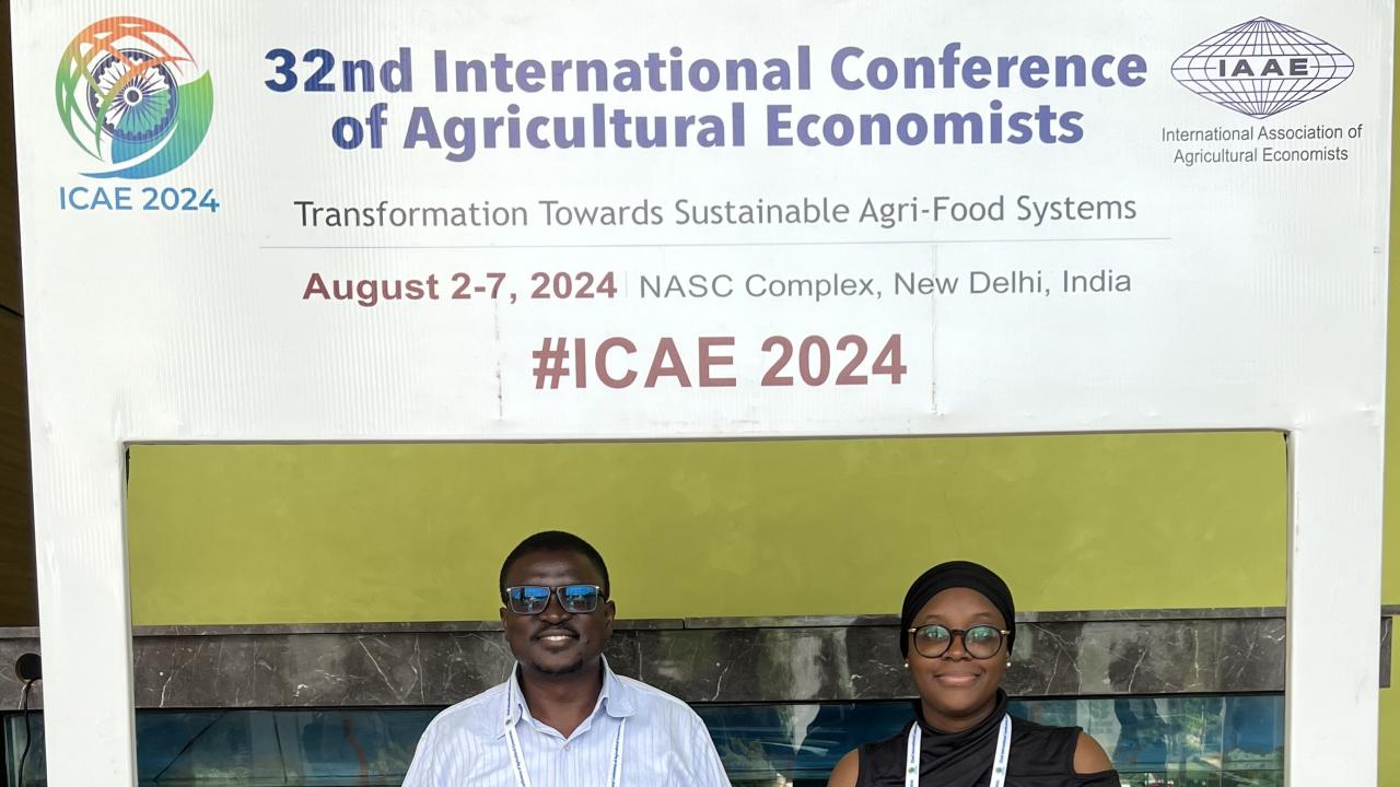 John Olwande and Khadijat Amolegbe pose with the ICAE banner
