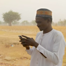 Nigerian man with phone