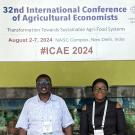John Olwande and Khadijat Amolegbe pose with the ICAE banner